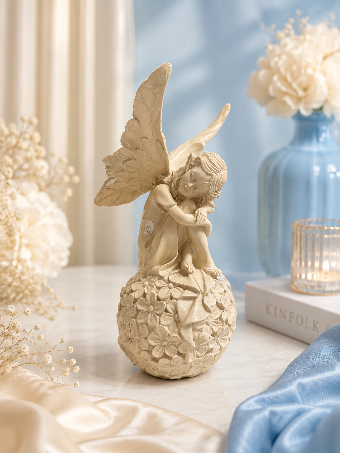 Resting Angel on Floral Ball – Elegant Resin Décor Figurine