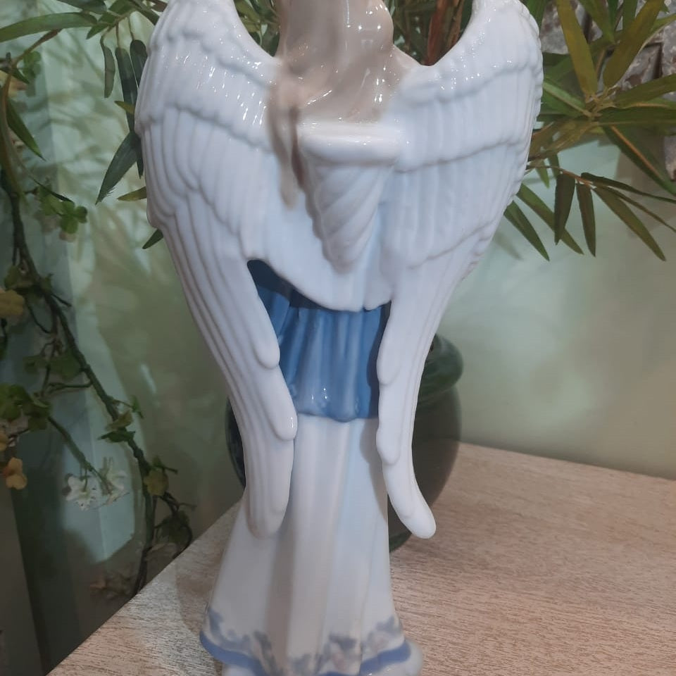 White and Blue Angel With The Musical Instrument